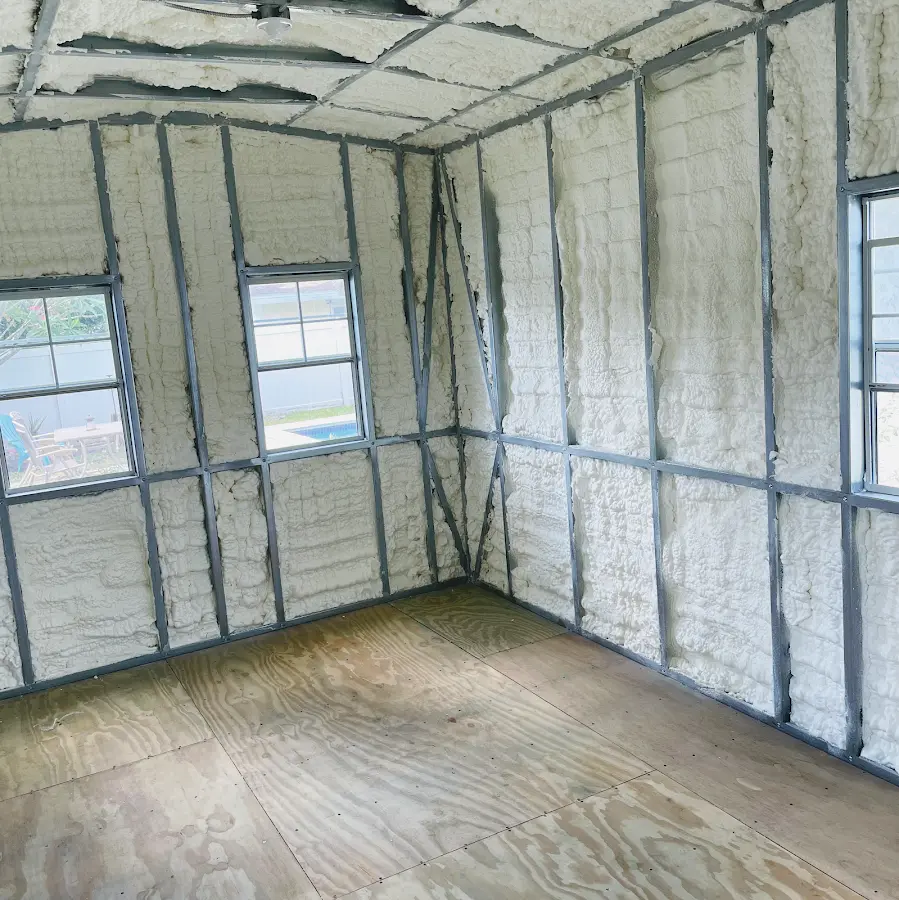 Closed-cell spray foam insulation applied to wall cavities in a residential project in Georgetown